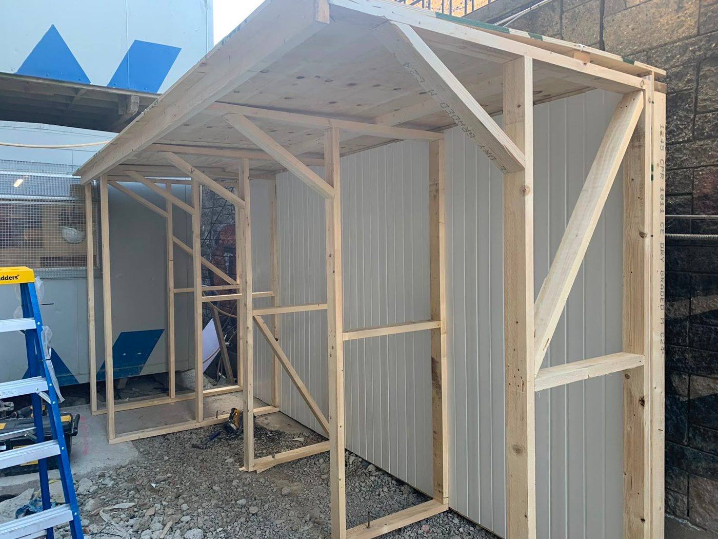 Timber-framed shelter under construction